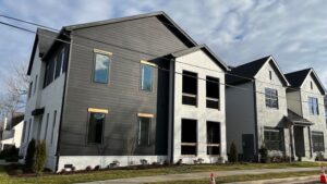 Image of builder showcasing home after asphalt paving Green Hills Nashville